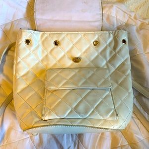 Selling a White Mini Backpack